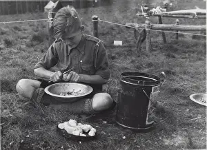 Culinary: Dutch boy scout preparing vegetables, Holland