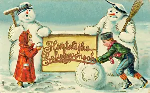 Snowmen: Two Dutch children with two snowmen