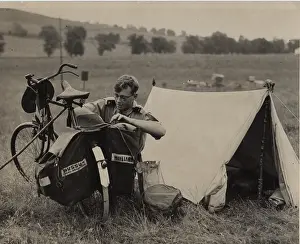 Moot: Dutch rover scout with bicycle and tent