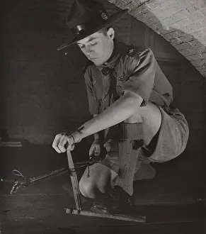 Spark: Dutch rover scout practising fire lighting