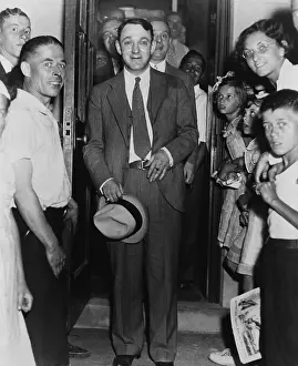 Litigation: Dutch Schultz, emerging from doorway of ?