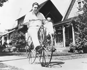 Hardwick: Dwight Hardwick riding a hand made bicycle built