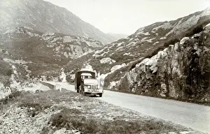 Glencoe: Early Caravan trundling through the Pass of Glencoe