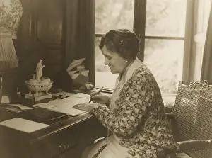 Wharton: Edith Wharton, writes at her desk in 1920