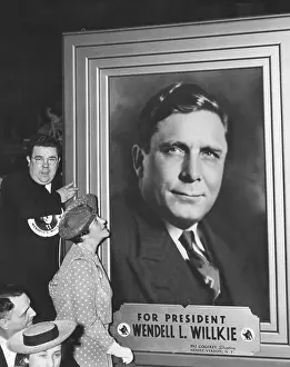 1397: Edith Willkie looks up at the oversized portrait