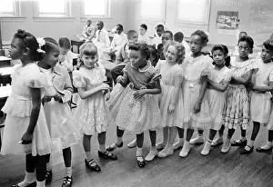 Racially: education - racial integration - civil rights - students