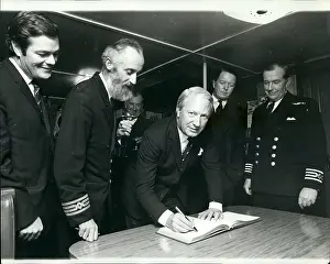 Accomplished: Edward Heath signs distinguished visitors book