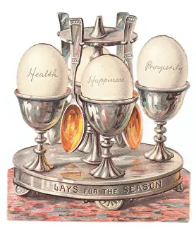 Eggcup: Eggcup stand with eggs on a cutout Christmas card