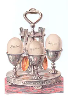 Eggcup: Eggcup stand with eggs on a cutout Christmas card