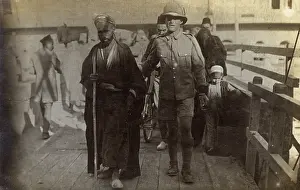 Harbout: Egypt - British Soldier escorting an old blind Arab man