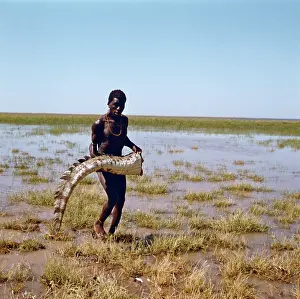 Turkana: An El Molo Man with a crocodile tail