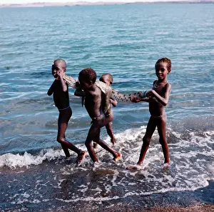 Turkana: El Molo youngsters taking home their breakfast