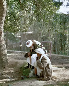 Pht001: Two Elder Afghani Men Sitting in Shade of A Tree