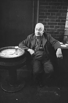 Stange: An elder man is drinking a so-called