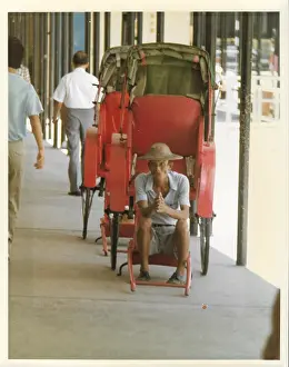 The British Caribbean History Collection: Elderly Chinese man in an empty red rickshaw