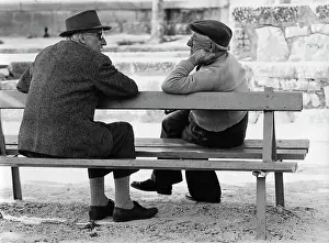 Krish: Two elderly men chatting on a bench
