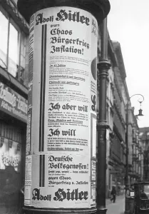 Suggested: Election poster of the NSDAP on an advertising column, 1932