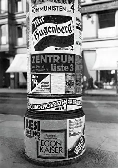 Reason: Election posters on an advertising column on