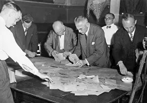 Ballots: Election workers during the count of votes after the first R