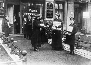 Assistants: Electoral assistants distribute flyers for the general elect