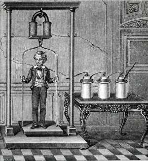 Supporting: Electromagnet supporting the weight of a boy