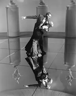Infatuated: Elegant couple dancing together