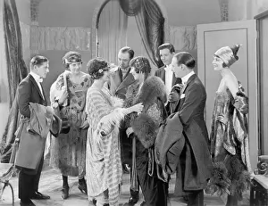 Reverie: Elegant group of friends greeting each other in