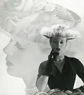 Millinery: Very elegant wide hat worn by a 1940s model