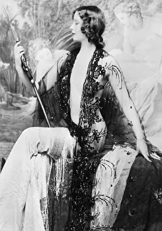 Embraces: Elegant woman admiring her form