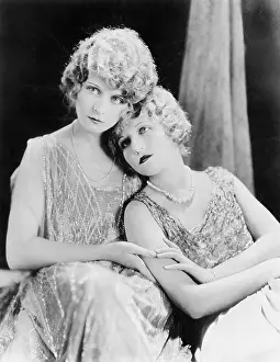Timid: Two elegant women sitting together