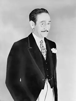 Mustaches: Elegantly dressed man with a monocle