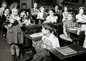 Aloud: Elementary School Classroom Girl Student Standing