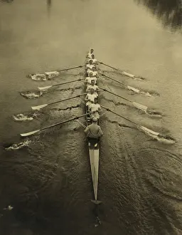 Coxswain: Elevated view of Cambridge Crew rowing, c