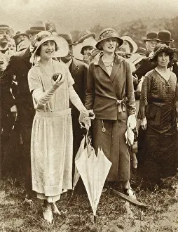 Underarm: Elizabeth, Duchess of York attempts to knock down a coconut