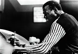 Elvin: ELVIN JONES, with his drums ?