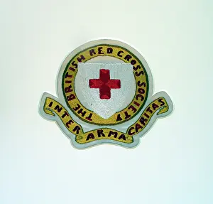 Wording: Embroidered badge of the British Red Cross