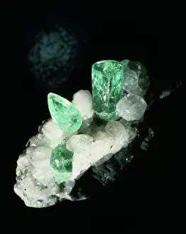Beryl: Emerald crystals and cut stone