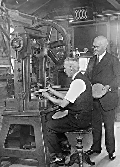 Produces: Emil Berliner in his laboratory, 1927