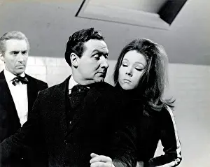 Respectively: Emma Peel & John Steed of The Avengers