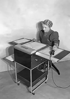 Index: Employee at an electric database, 1938