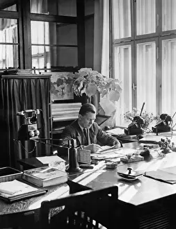 Concepts: Employee working in an office, 1938