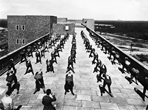 Rooftop: Employees are doing gymnastics on the rooftop of Siemens-Sch