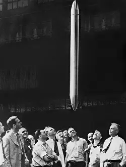 Formula: Employees visit a time capsule, 1938