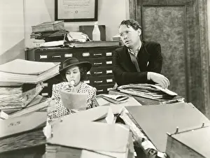 Businesswoman: Endless paperwork -