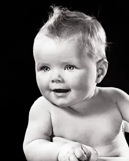 Engaging: Engaged Interested Baby Looking Off to the Left