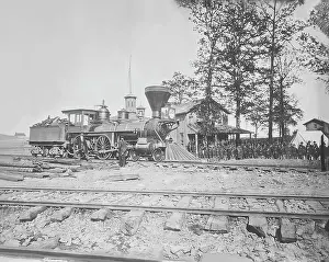 Freight: Engine No. 156 and company of infantry during