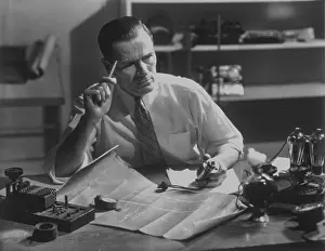Blueprints: Engineer At His Desk