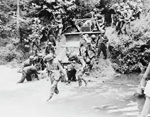 Culvert: Engineers putting a culver into place with
