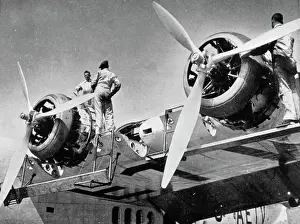 Propellers: Engineers working on aeroplane engines