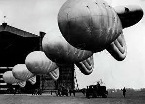 Outskirts: English barrage balloons, 1938